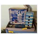 TIN MECHANICAL AUTO-LIFT WITH ORIGINAL BOX & CAR
