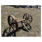 2 ANTIQUE METAL WHEELS ON AXLE