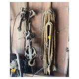 PULLEYS, METAL HOOKS, AND OLD ROPES