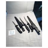 Three knives and two holders