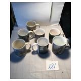 Seven coffee mugs