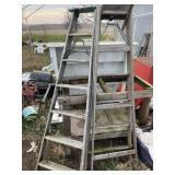 Two wooden step ladders