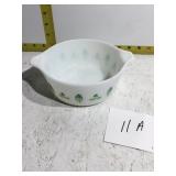 White with green And blue leaves Pyrex bowl