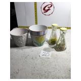 Two flowerpots and two bottles