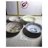 Four serving bowls