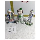 Three porcelain clown figurines