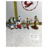 Four clown figurines