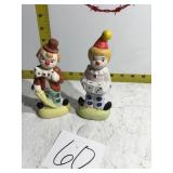 Two clown figurines the brand is got