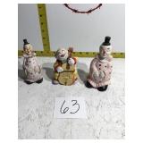 Three bell clown figurines