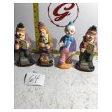 Four clown figurines