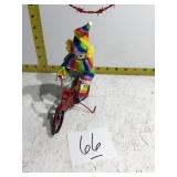 Clown on a bicycle