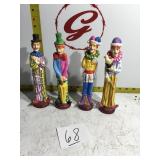 Four clown figurines