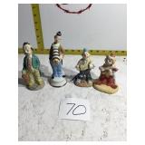 Four clown figurines