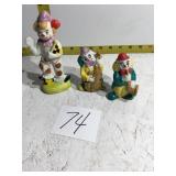 Three ceramic clowns figurines