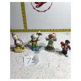 Four clown figurines