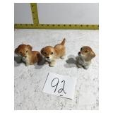 Three porcelain dogs