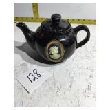 Tea pot with a cameo