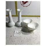 To milk glass vases and two candleholders
