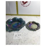 Two carnival glass plates
