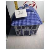Blue and white house cookie jar