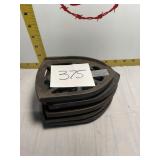 Five iron holders trivets