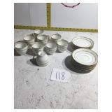 12 small saucers and nine small cups