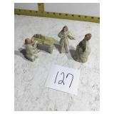 Miniature piano and figure on piano seat and 2
