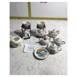 Miniature tea pots and two teapot sets with a cup
