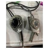 2 bolo ties