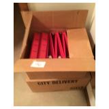 Two boxes of binders
