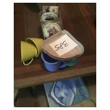 Cups coasters and miscellaneous pins