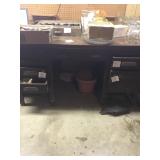 Wooden desk workbench items on top arenot