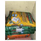 Six bags of fertilizer lawn