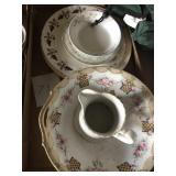 4 decortive plates bowl and pitcher