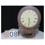 Clock with Roman numeral face