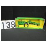 John Deere tractor & 4 bottom plow