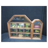 Wall shelf with contents of toy tractors