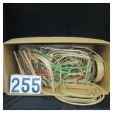 Large box of unused basket handles