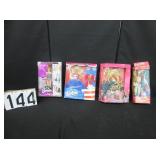 4 Barbie Dolls