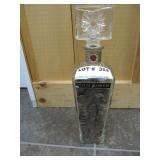 Decanter of approximately 820 copper pennies