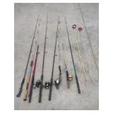 8 Assorted Fishing Poles and Driveway Markers