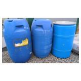 Three Blue Plastic Barrels