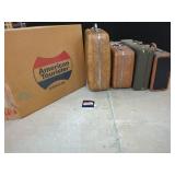 Four Assorted Suitcases