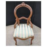 CARVED WOOD SIDE CHAIR WITH UPHOLSTERED SEAT