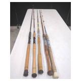 FIVE ASSORTED FISHING RODS WITH WOODEN HANDLES