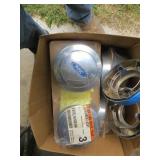 box of old Ford wheel covers, lug nut covers,