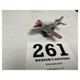 Vintage tin toy friction airplane. Made in Japan