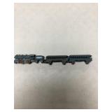 Vintage Small Cast Iron Train and 2 Passenger