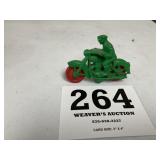 Auburn plastic toy motorcycle Green in color.