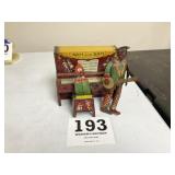 Vintage tin toy of Ham and Sam The Minstrel Team.